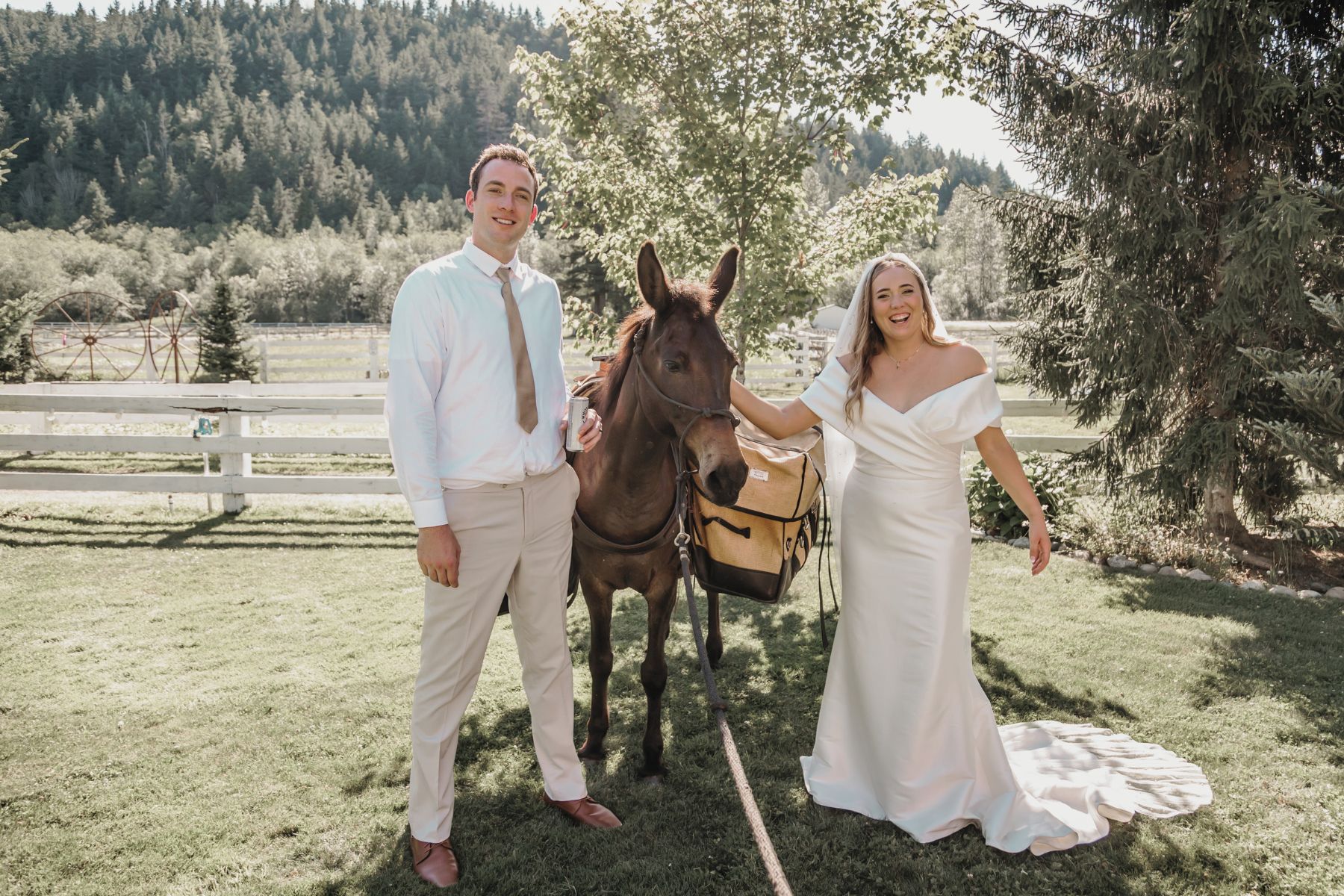 Bride and groom with cocktail hour mobile beer burro