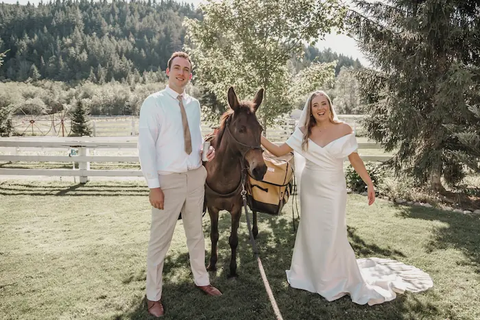 Bride and groom with cocktail hour mobile beer burro